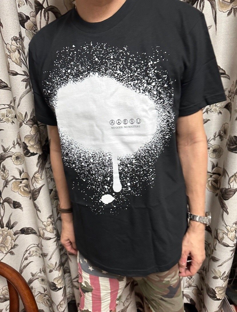 Supreme Paint-Drip Graphic T-Shirt — model