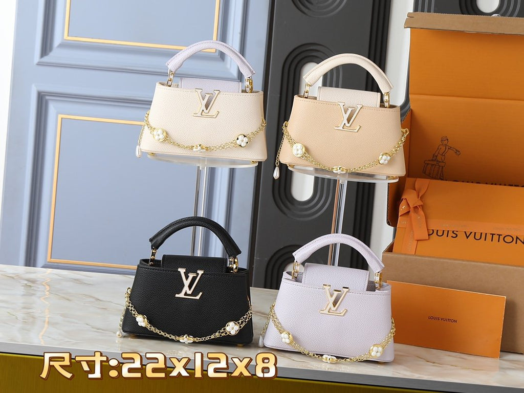 Louis Vuitton Capucines East-West Floral Chain Bag — comparison