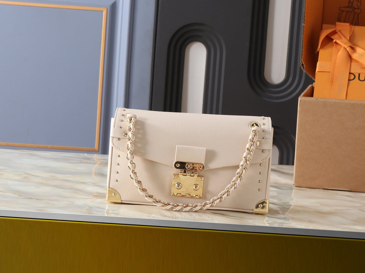Louis Vuitton Trunkie East West Cream Shoulder Bag — hero
