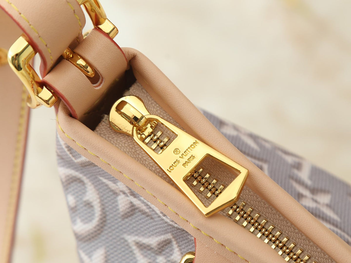 Louis Vuitton Carryall East-West Monogram Emblème Shoulder Bag — detail