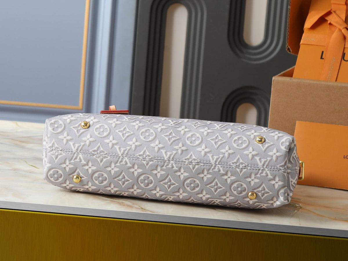 Louis Vuitton Carryall East-West Monogram Emblème Shoulder Bag — detail