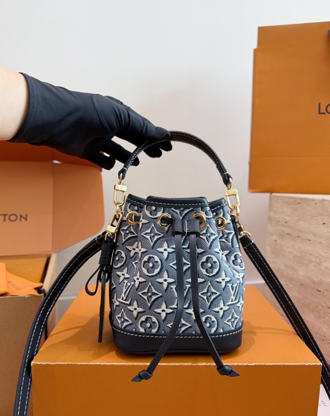 Louis Vuitton Nano Noe Blue-Gray Monogram Bucket Bag — model