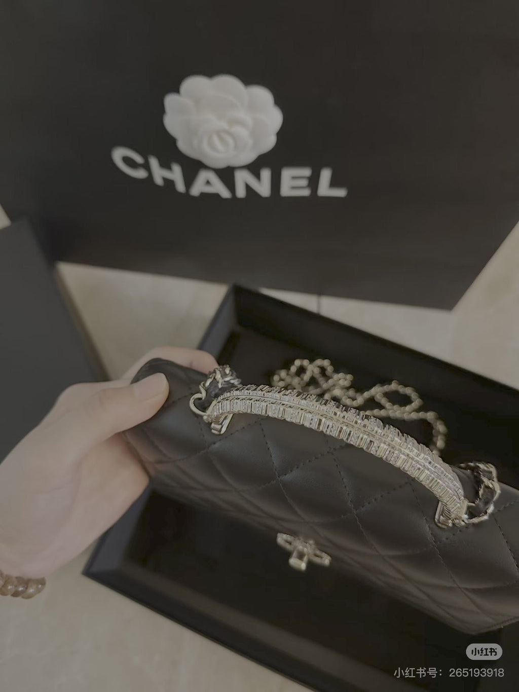 Chanel Quilted Flap Bag with Jeweled Arch Handle — front