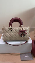 Dior D-Joy Quilted Top-Handle Bag with Burgundy Bow — hero
