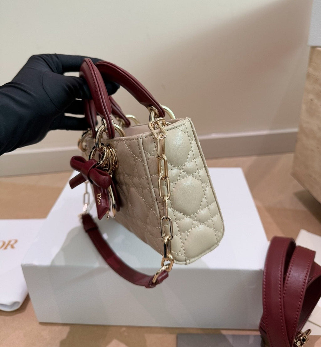 Dior D-Joy Quilted Top-Handle Bag with Burgundy Bow — side