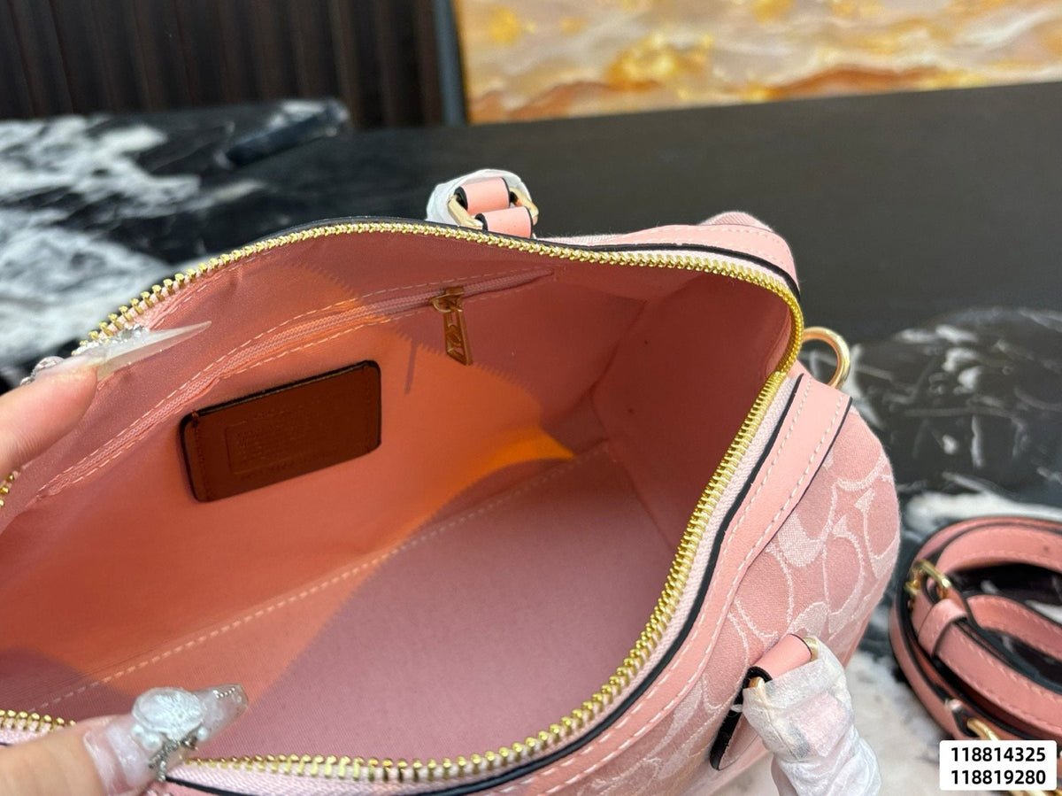 Coach Rowan Pink Signature Barrel Bag — front