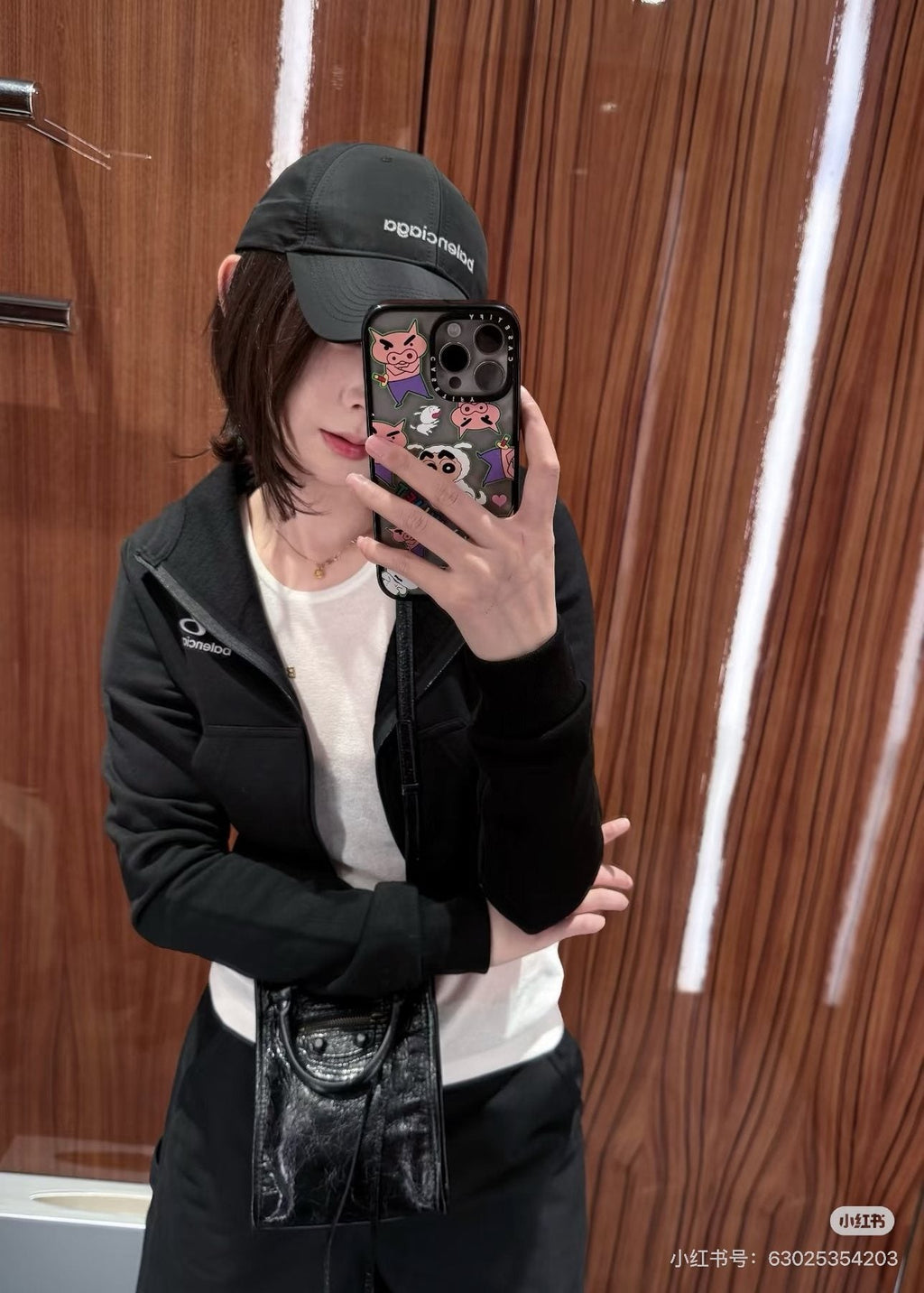 Balenciaga Le Cagole Nano Studded Phone Bag — model