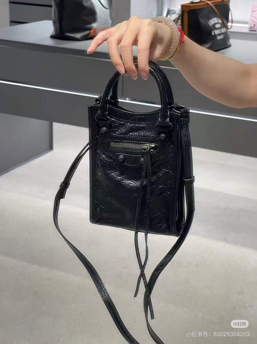 Balenciaga Le Cagole Nano Studded Phone Bag — hero