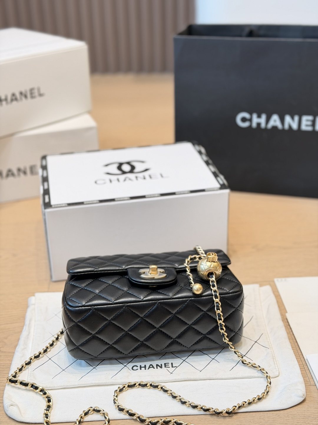 Chanel CF Quilted Flap Bag with Gold-Tone Ball Chain — side