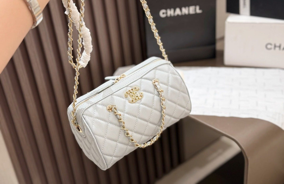 Chanel Quilted Bowling Bag with Jeweled CC Emblem — front