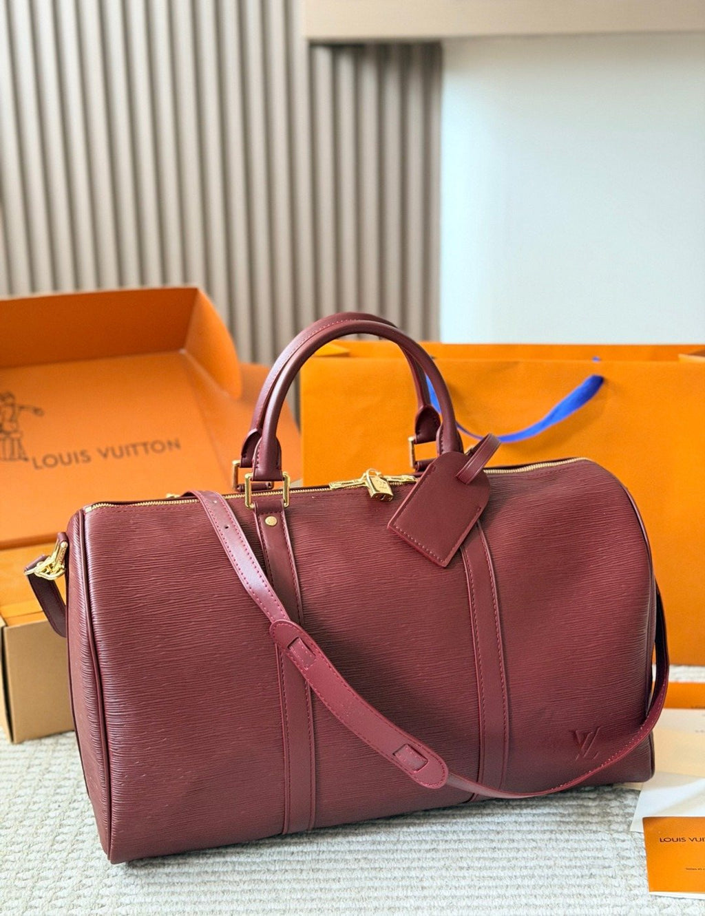 Louis Vuitton Keepall Burgundy Leather Travel Bag — side