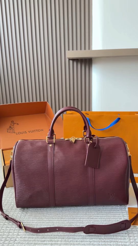 Louis Vuitton Keepall Burgundy Leather Travel Bag — hero