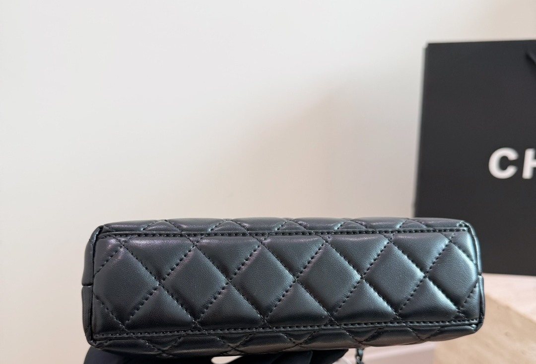 Chanel Kelly Quilted Top-Handle Bag — detail