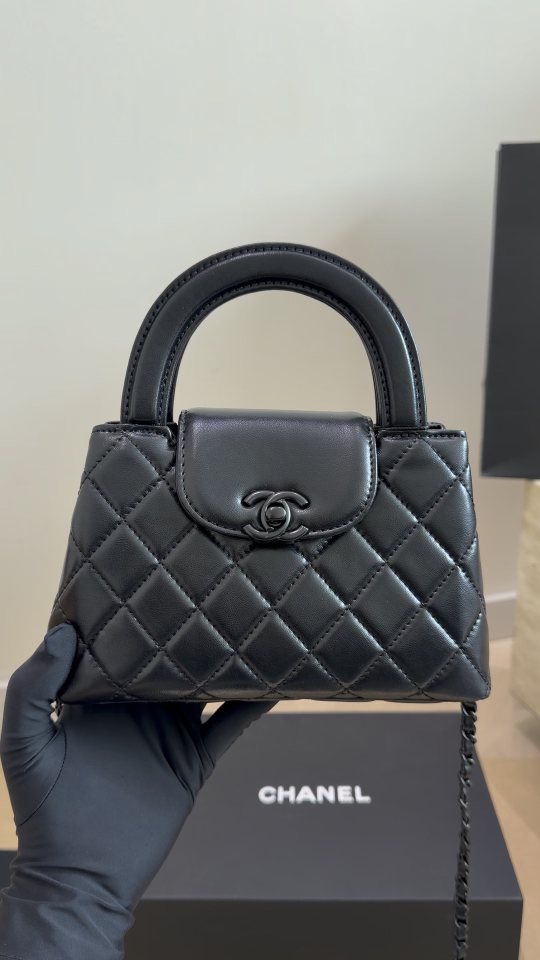 Chanel Kelly Quilted Top-Handle Bag — hero